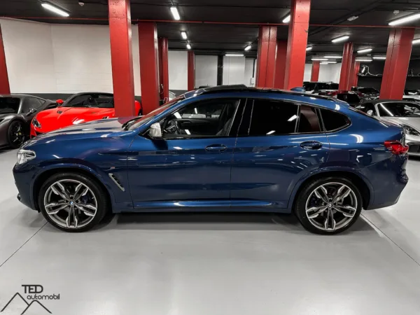 BMW X4 M40i 354cv Blau 08